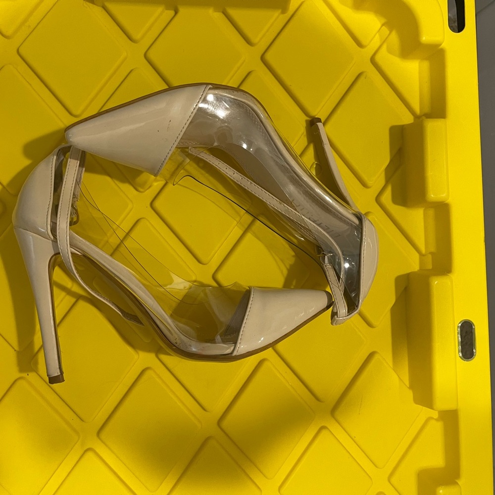 Tan and clear point toe strapped heels